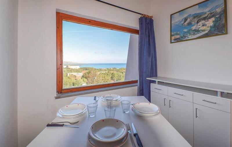 Residence Capo Falcone Charming Apartments Stintino Bagian luar foto